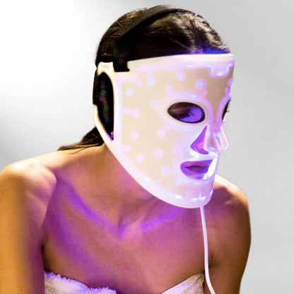 Woman wearing 100-LED Light Therapy Mask